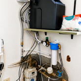 Waterontharder met filter en osmose systeem voor kalkvrij, zuiver water in woninginstallatie